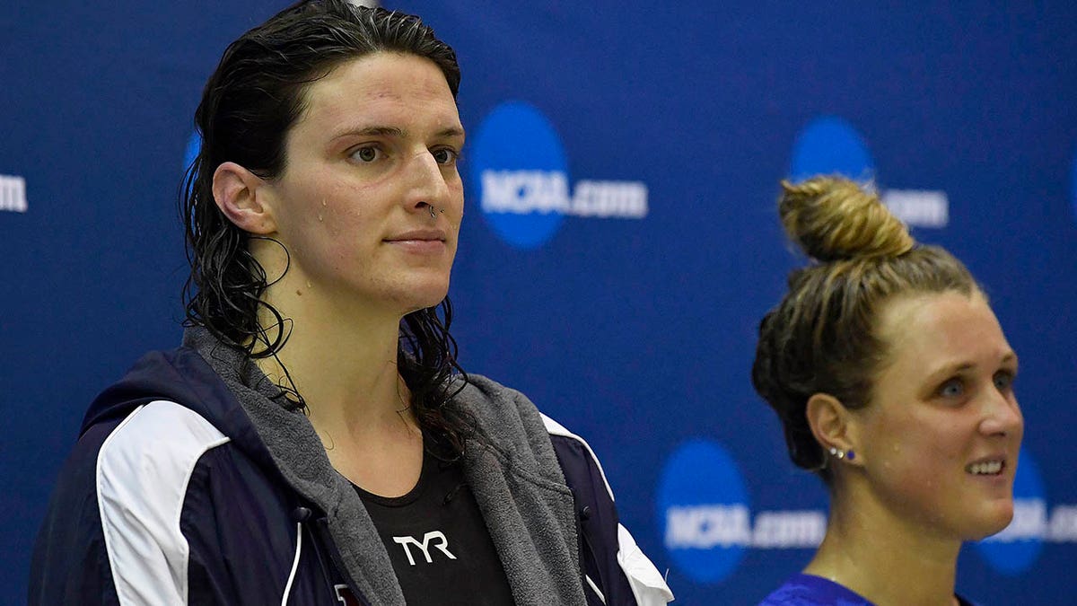 Lia Thomas looks on from the podium after finishing fifth in the 200 Yard Freestyle during the 2022 NCAA Division I Women's Swimming &amp;amp; Diving Championship at the McAuley Aquatic Center on the campus of the Georgia Institute of Technology on March 18, 2022 in Atlanta, Georgia.