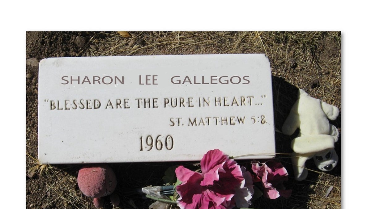 A grave marker identified the plot as that of Sharon Gallegos. 