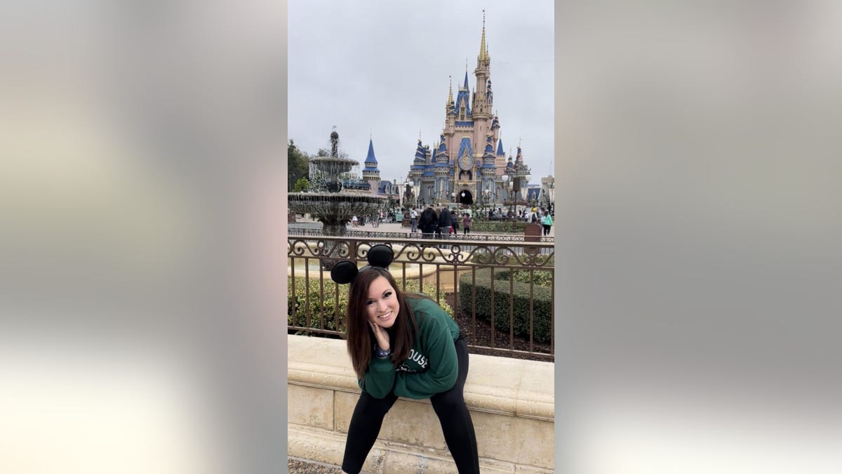 Liz Gramlich at the Disney World Castle