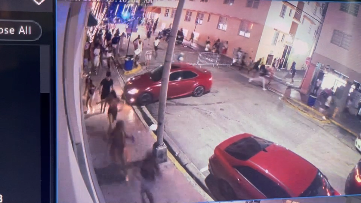 Spring breakers flee a shooting in Miami Beach.