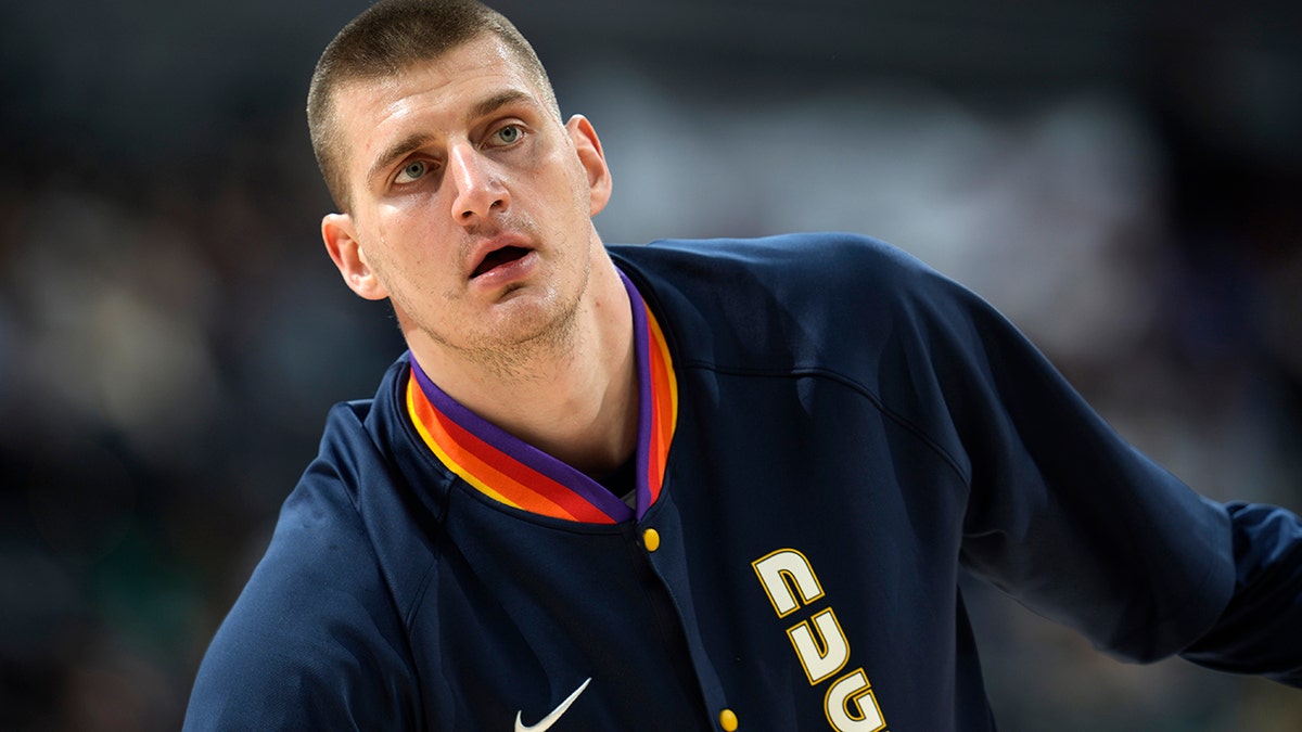 Denver Nuggets center Nikola Jokic warms up for the team's NBA basketball game against the Los Angeles Clippers on Tuesday, March 22, 2022, in Denver.