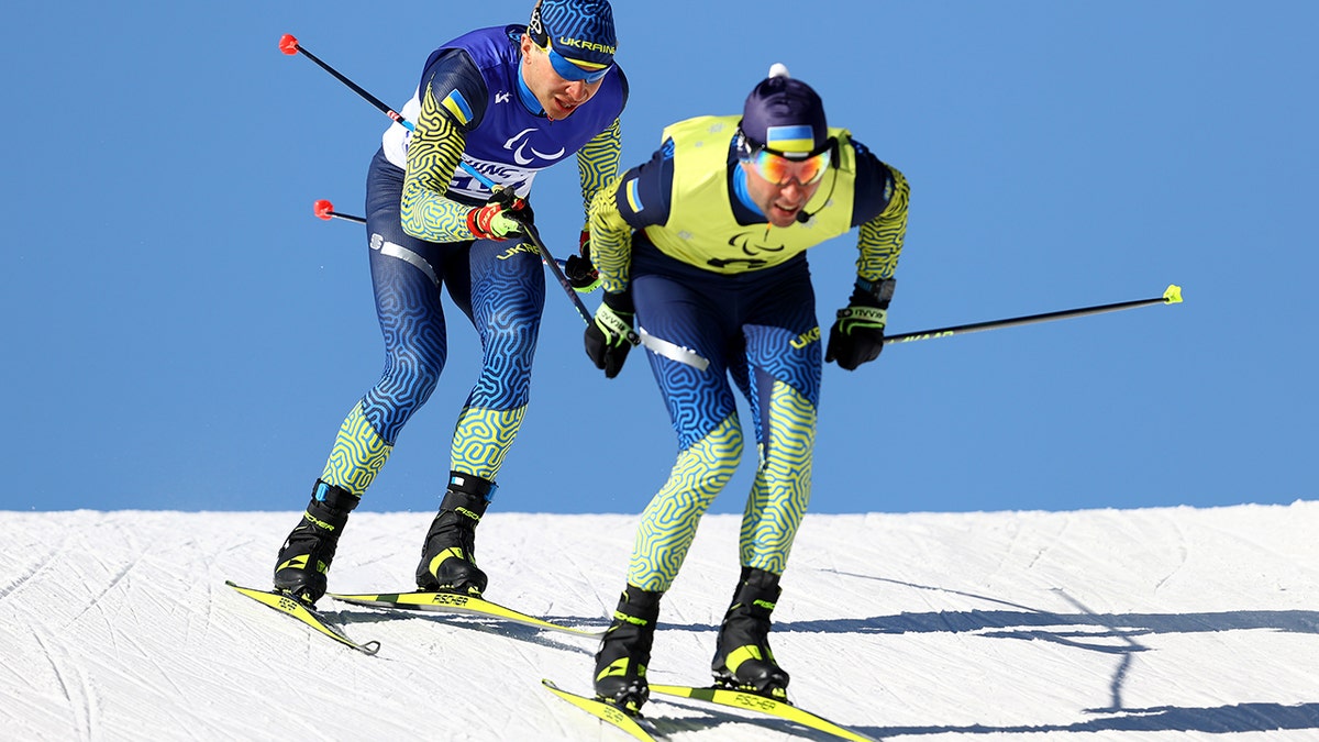 Oleksandr Kazik of Team Ukraine and his guide Serhii Kucheruavyi compete in the Men's Sprint Vision Impaired Para Biathlon during Day One of the Beijing 2022 Winter Paralympics at Zhangjiakou National Biathlon Centre on March 05, 2022 in Beijing, China.