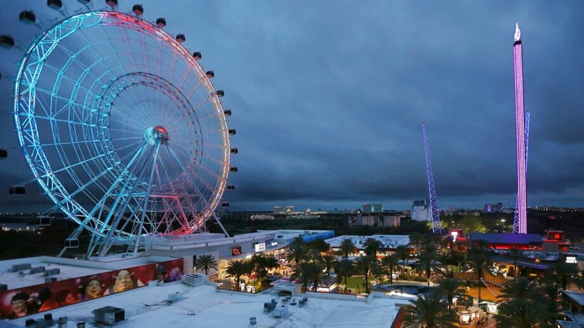 The Wheel at Icon Park is at left, Orlando SlingShot in middle, and Orlando FreeFall is at right. 