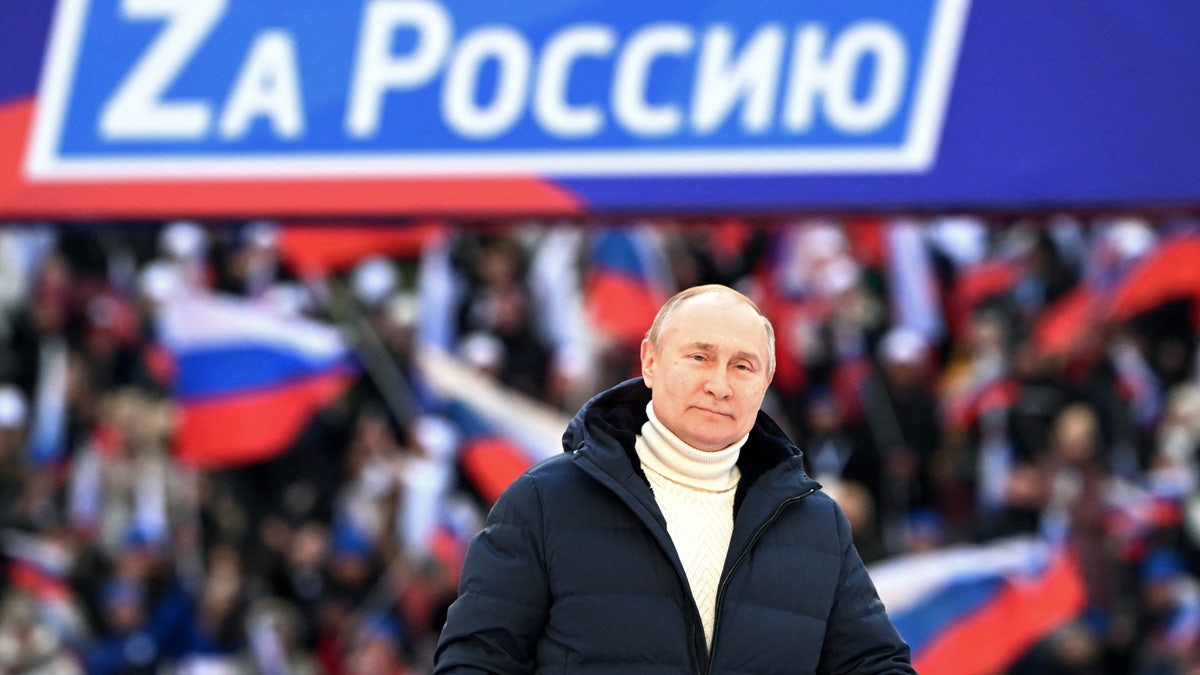 President Vladimir Putin tells crowd in Moscow Russia will win Ukraine war