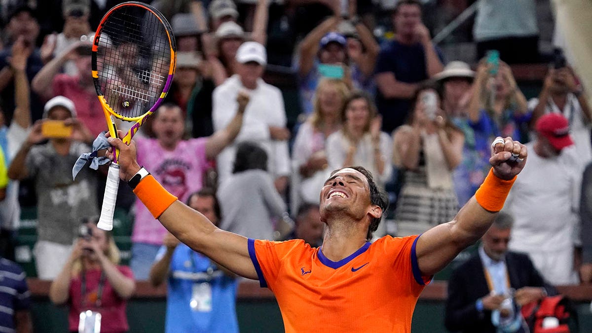 Rafael Nadal, of Spain, celebrates after defeating Carlos Alcaraz, of Spain, during the men's singles semifinals at the BNP Paribas Open tennis tournament Saturday, March 19, 2022, in Indian Wells, Calif. Nadal won 6-4, 4-6, 6-3.