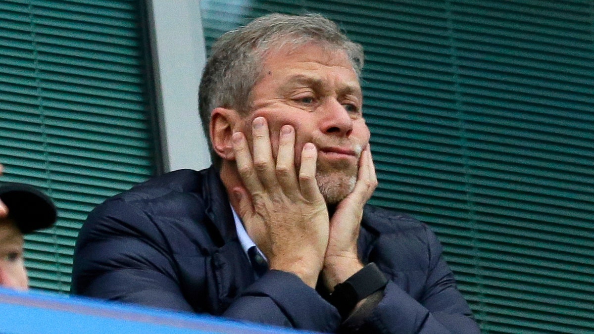 FILE - Chelsea soccer club owner Roman Abramovich sits in his box before their English Premier League soccer match against Sunderland at Stamford Bridge stadium in London, Dec. 19, 2015.