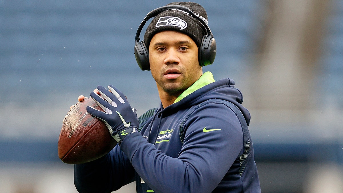 Russell Wilson #3 of the Seattle Seahawks warms up before the game against the Detroit Lions at Lumen Field on January 02, 2022 in Seattle, Washington.