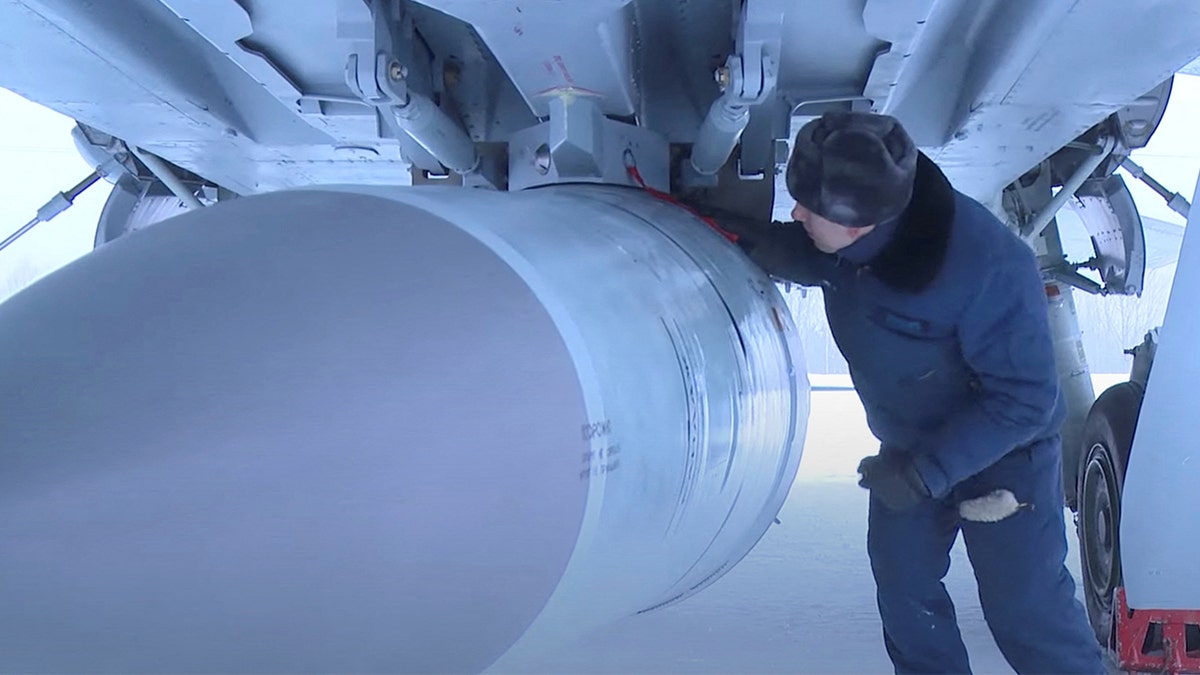 FILE - An airman checks a Russian Air Force MiG-31 fighter jet prior a flight with Kinzhal hypersonic missile during a drill in an unknown location in Russia, in this still image taken from video released February 19, 2022. Russian Defence Ministry/Handout via REUTERS