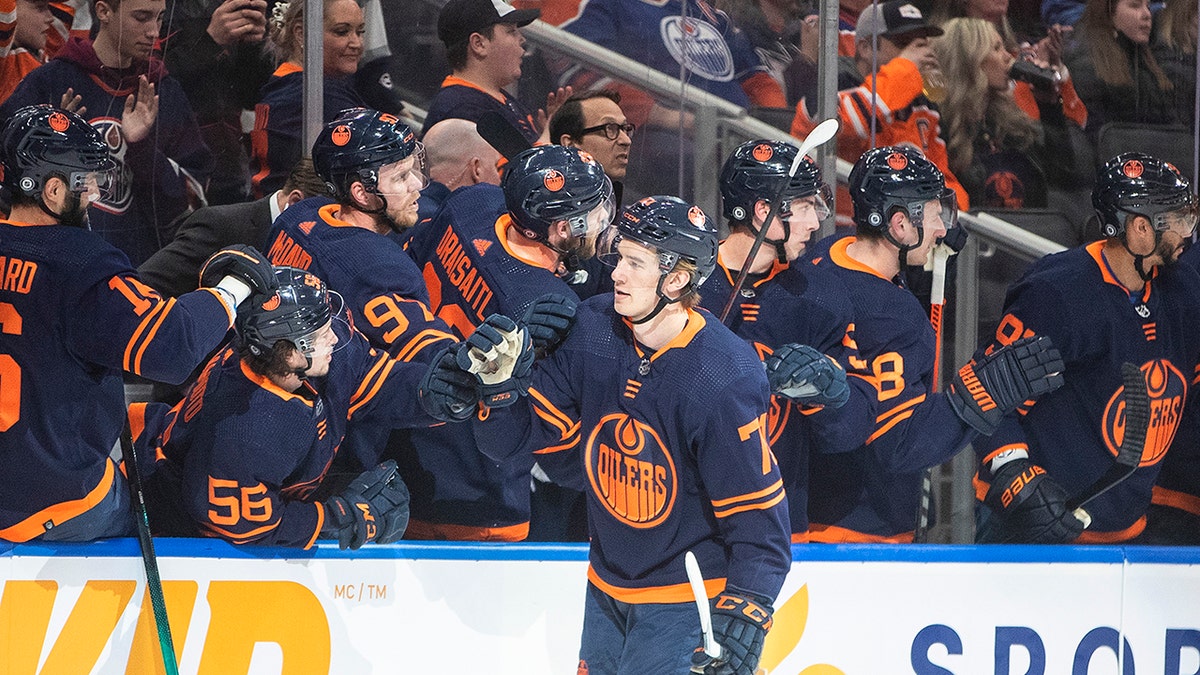 Edmonton Oilers' Ryan McLeod (71) celebrates a goal against the Arizona Coyotes during first-period NHL hockey game action in Edmonton, Alberta, Monday, March 28, 2022.