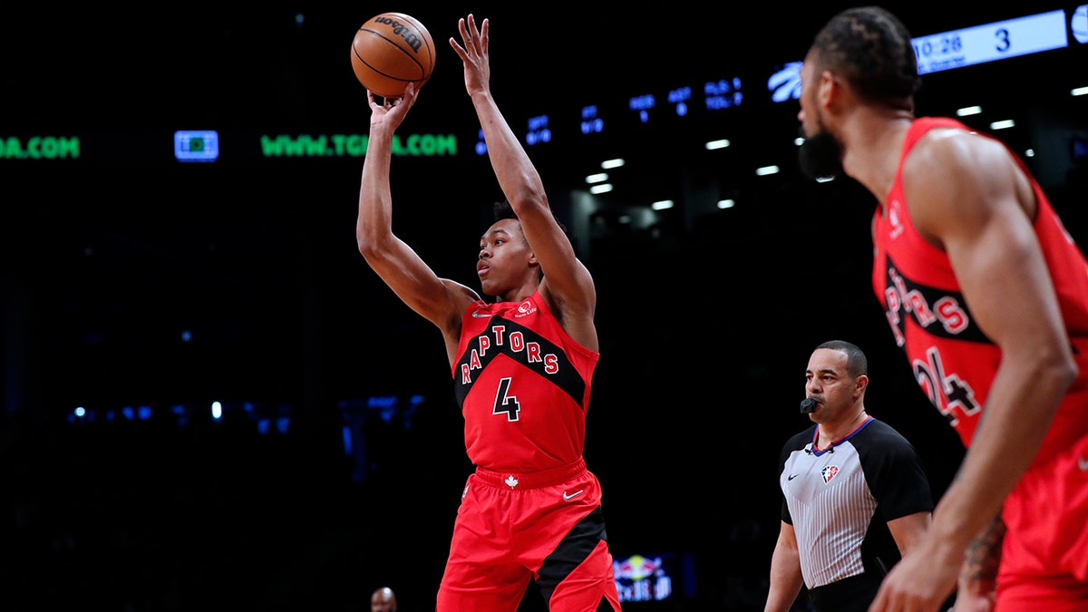 Toronto Raptors forward Scottie Barnes (4) shoots against the Brooklyn Nets during the first half of an NBA basketball game Monday, Feb. 28, 2022, in New York.
