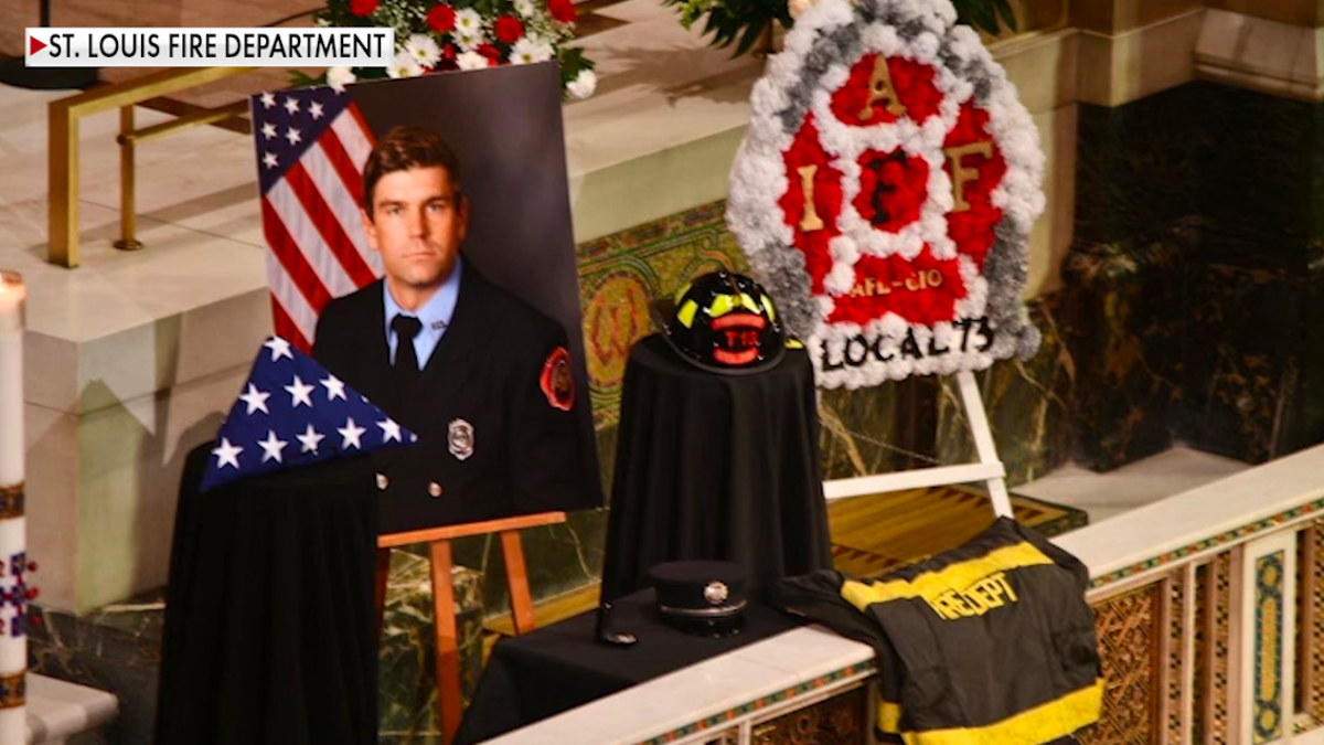 Image from Firefighter Ben Polson's funeral after he was killed fighting a fire in an abandoned building.