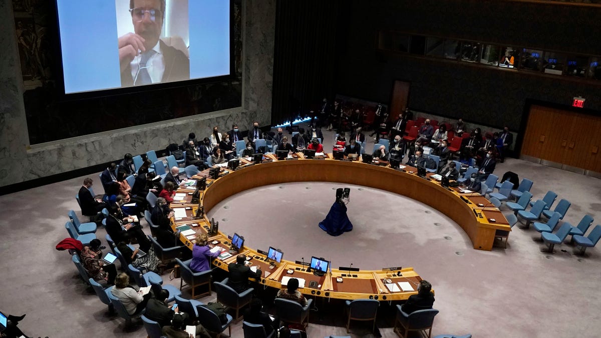 IAEA Director General Rafael Mariano Grossi, on screen, addresses the U.N. Security Council, Friday, March 4, 2022.