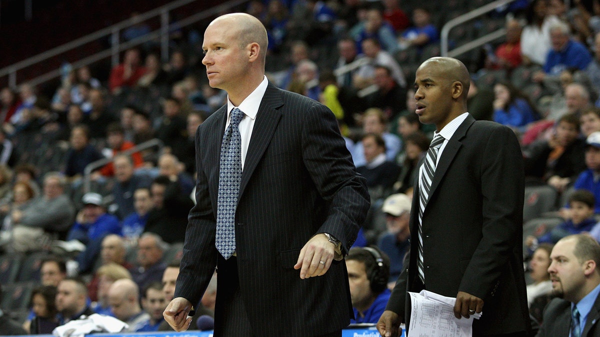 Head coach Kevin Willard and associate head coach Shaheen Holloway of the Seton Hall Pirates coach against the Auburn Tigers at Prudential Center on Dec. 2, 2011 in Newark, New Jersey. 
