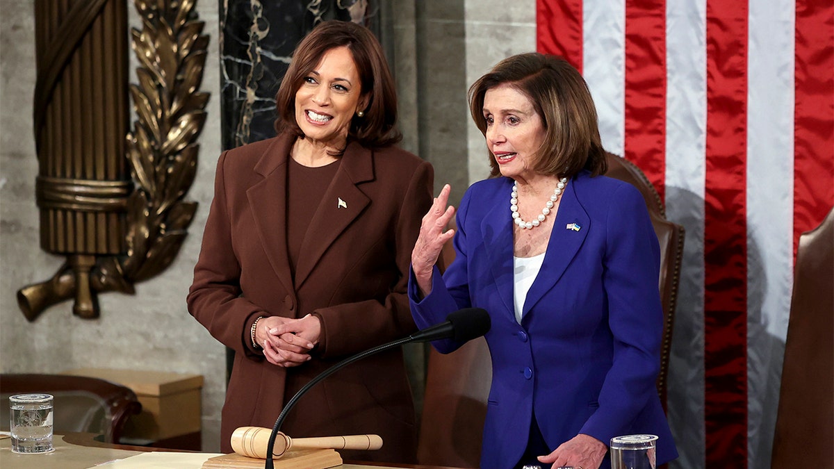 Vice President Kamala Harris talks with House speaker Nancy Pelosi of Calif., in the chamber of the House of Representatives before the State of the Union address by President Joe Biden to a joint session of Congress at the Capitol, Tuesday, March 1, 2022, in Washington. (Julia Nikhinson/Pool via AP)