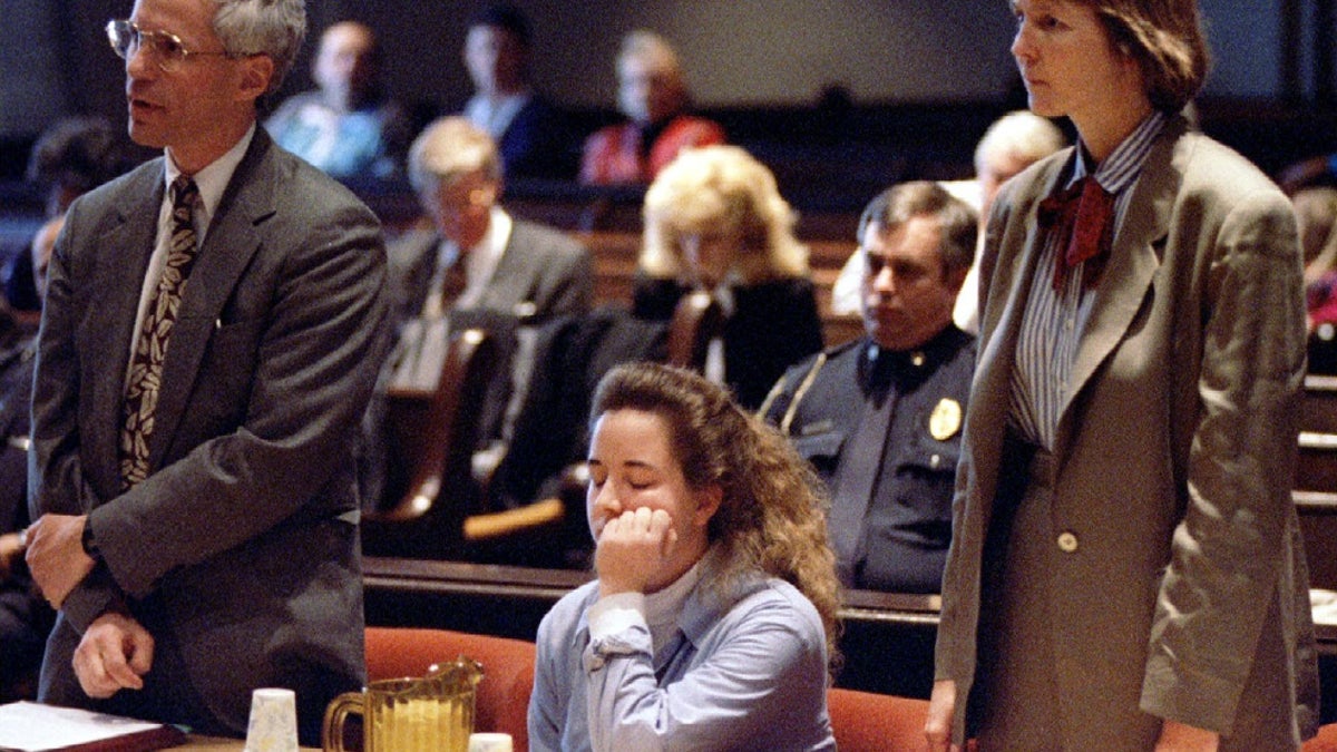 Susan Smith is seated between her lawyers during a court hearing in the Union County Courthouse.