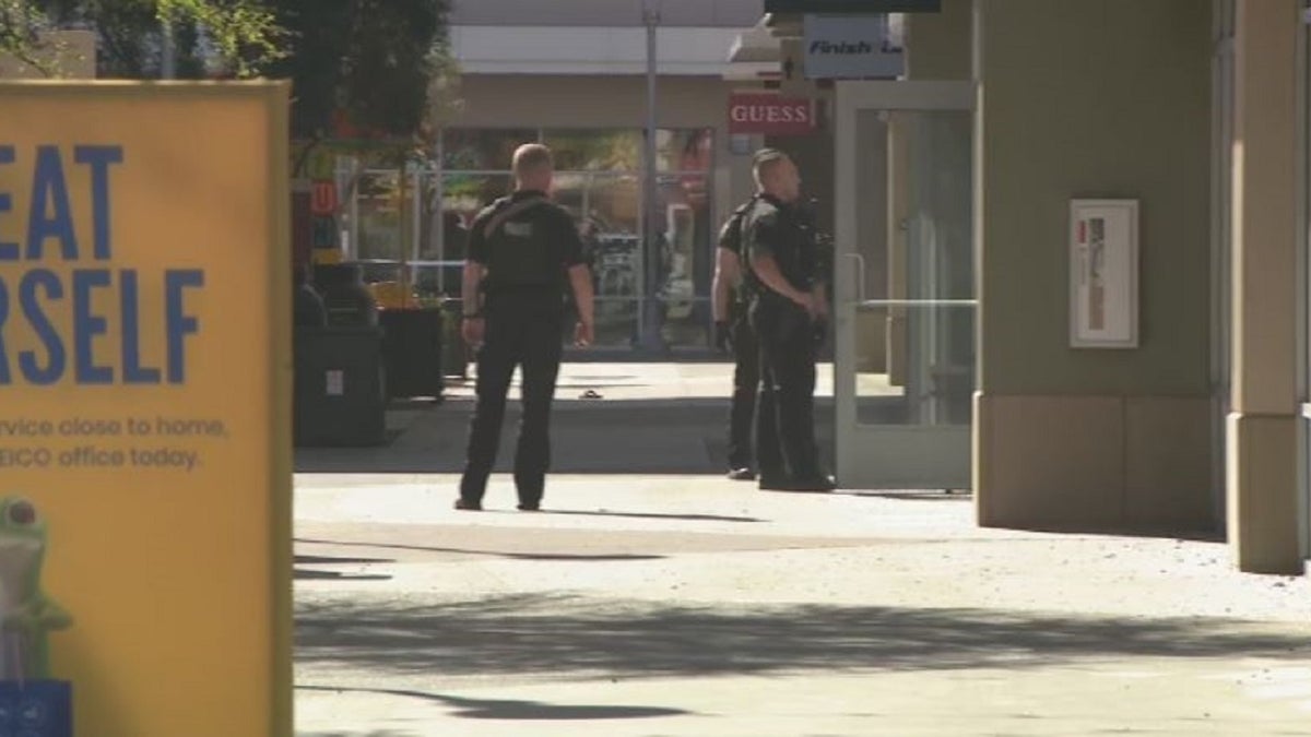 Glendale, Arizona police at the Tanger Outlets after a shooting injured at least one person on Wednesday. 