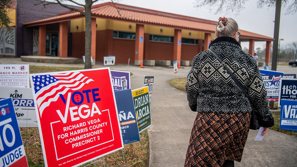 Texas 2022 primary elections signs outside a community center on Feb. 24, 2022