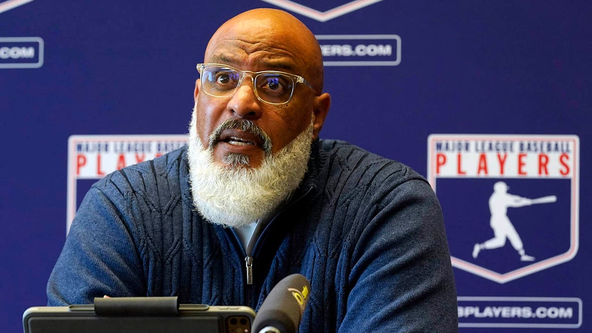 Major League Baseball Players Association Executive Director Tony Clark answers a question at a press conference in their offices in New York, Friday, March 11, 2022. Major League Baseball’s players and owners ended their most bitter money fight in a quarter-century Thursday when the players’ association accepted management’s offer to salvage a 162-game season that will start April 7.