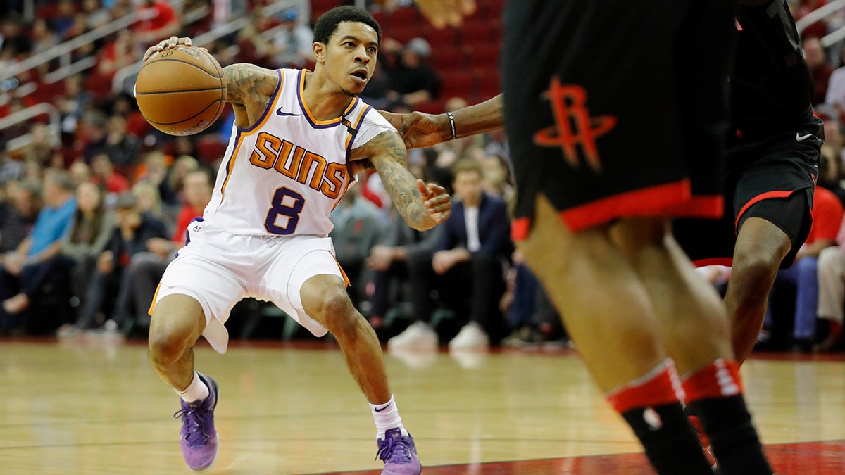 Tyler Ulis #8 of the Phoenix Suns drives to the basket against the Houston Rockets in the first half at Toyota Center on March 30, 2018 in Houston, Texas.   