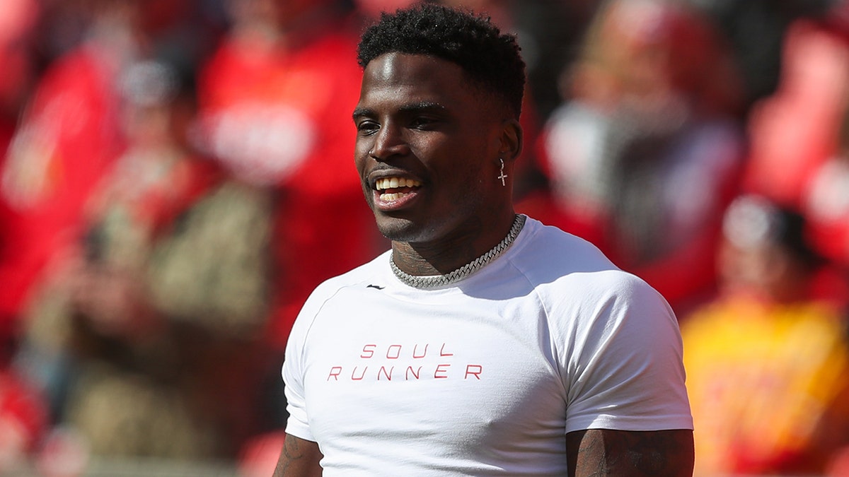 Kansas City Chiefs wide receiver Tyreek Hill smiles before the AFC Championship game between the Cincinnati Bengals and Kansas City Chiefs on Jan 30, 2022, at GEHA Field at Arrowhead Stadium in Kansas City, Missouri.