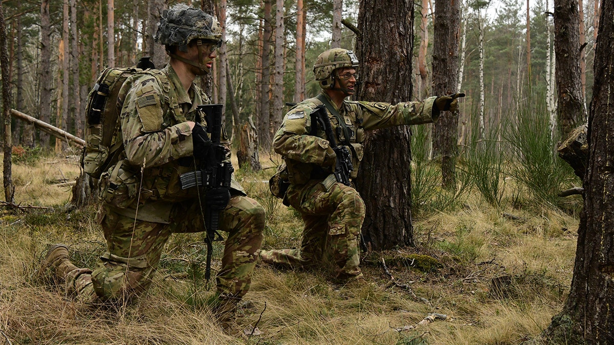 U.S. Army paratroopers assigned to the 54th Brigade Engineer Battalion, 173rd Airborne Brigade prepare to breach an obstacle at Grafenwoehr Training Area, Germany, March 6, 2022. (U.S. Army photo by Spc. Ryan Parr)
