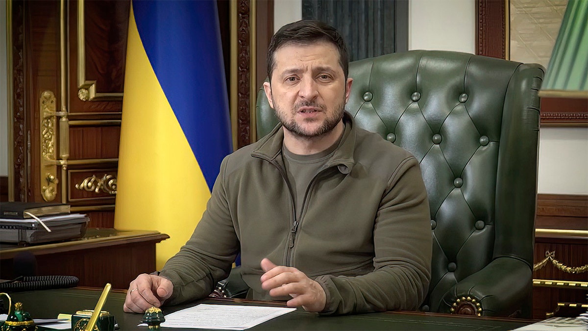 In this image from video provided by the Ukrainian Presidential Press Office and posted on Facebook, Ukrainian President Volodymyr Zelenskyy speaks in Kyiv, Ukraine, on early Wednesday, March 16, 2022. (Ukrainian Presidential Press Office via AP)