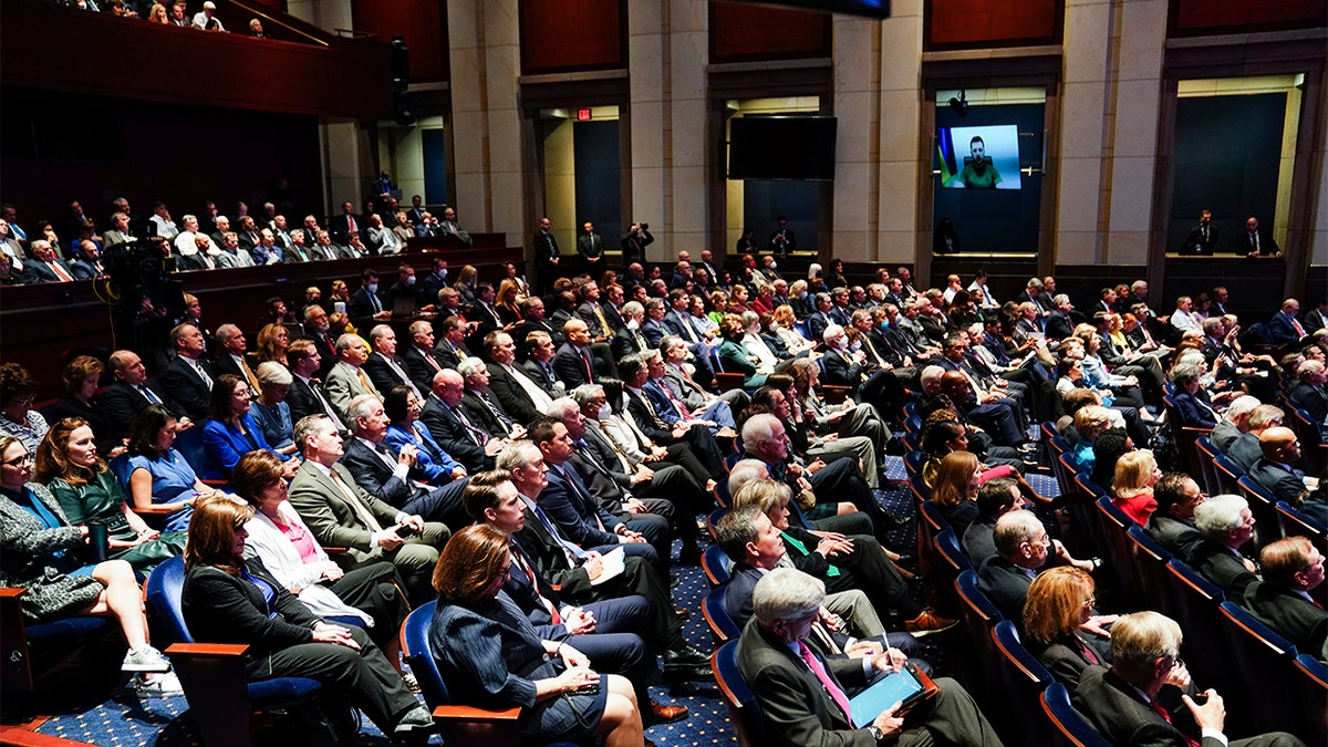 Ukrainian President Volodymyr Zelenskyy delivers a virtual address to Congress by video at the Capitol in Washington, Wednesday, March 16, 2022. (Sarah Silbiger, Pool via AP)