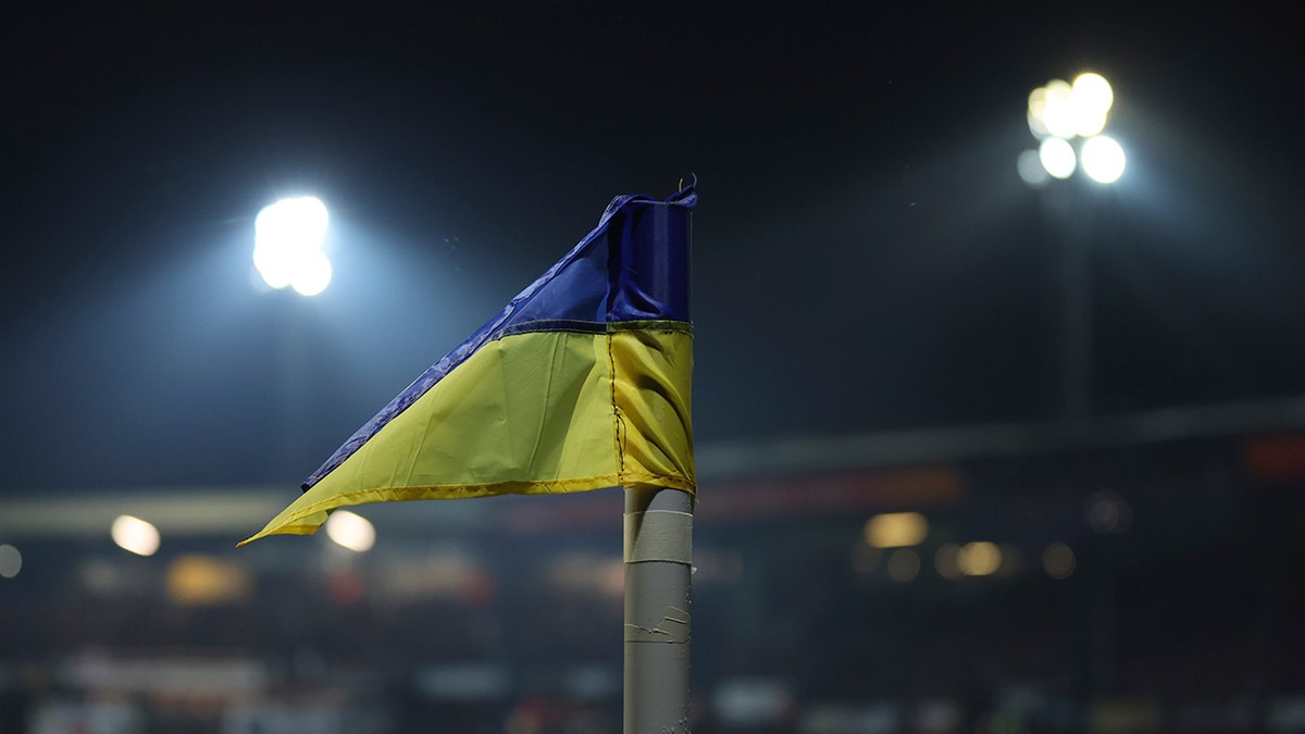 A corner flag replaced by a Ukraine flag on the pitch during the FA Cup fifth- round soccer match between Luton Town and Chelsea at Kenilworth Road in Luton, England, Wednesday, March 2, 2022. 