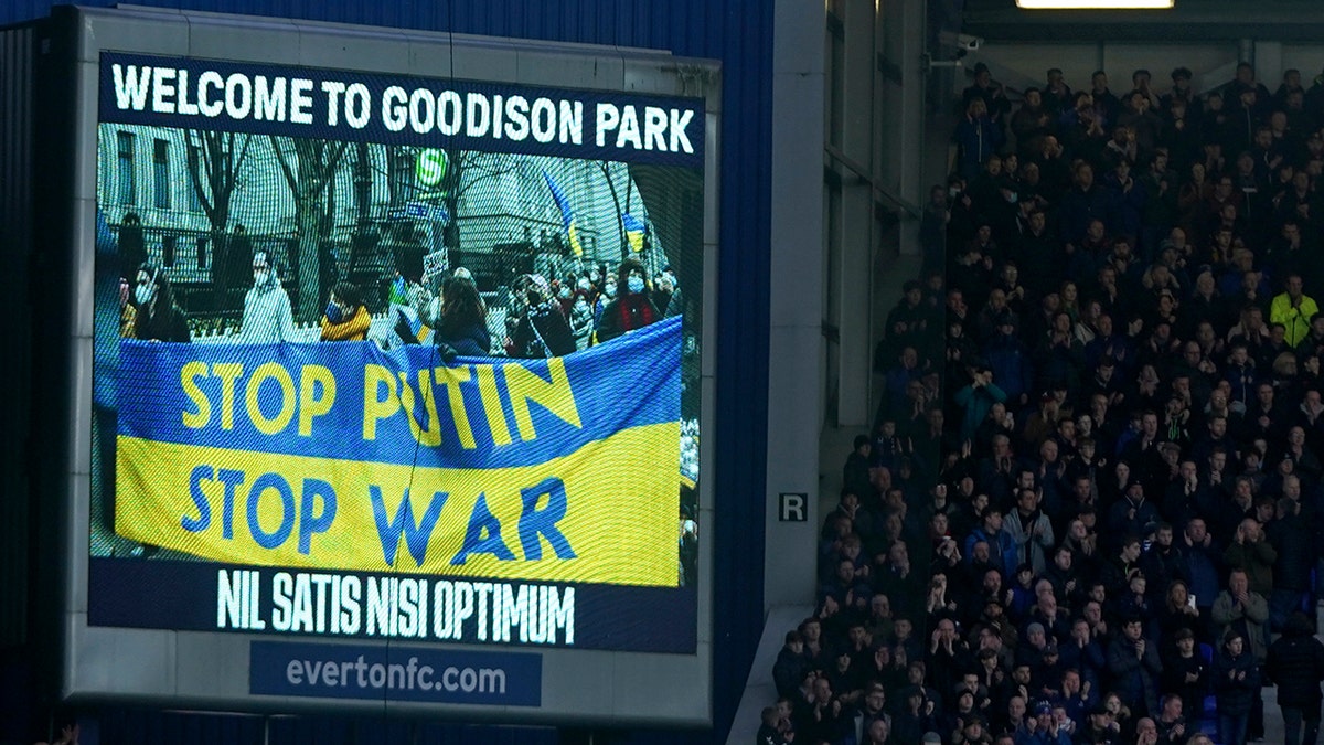 A screen shows support to Ukraine before the English Premier League soccer match between Everton and Manchester City at Goodison Park in Liverpool, England, Feb. 26, 2022.
