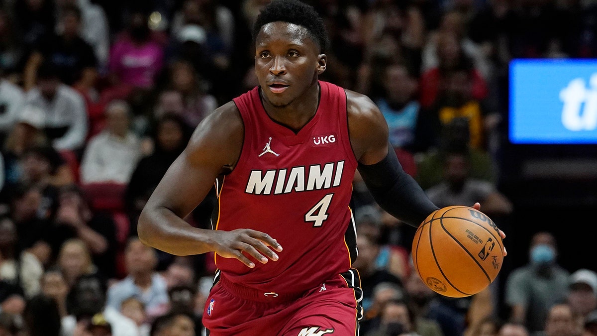 Miami Heat guard Victor Oladipo (4) handles the ball during the second half of an NBA basketball game against the Houston Rockets, Monday, March 7, 2022, in Miami.