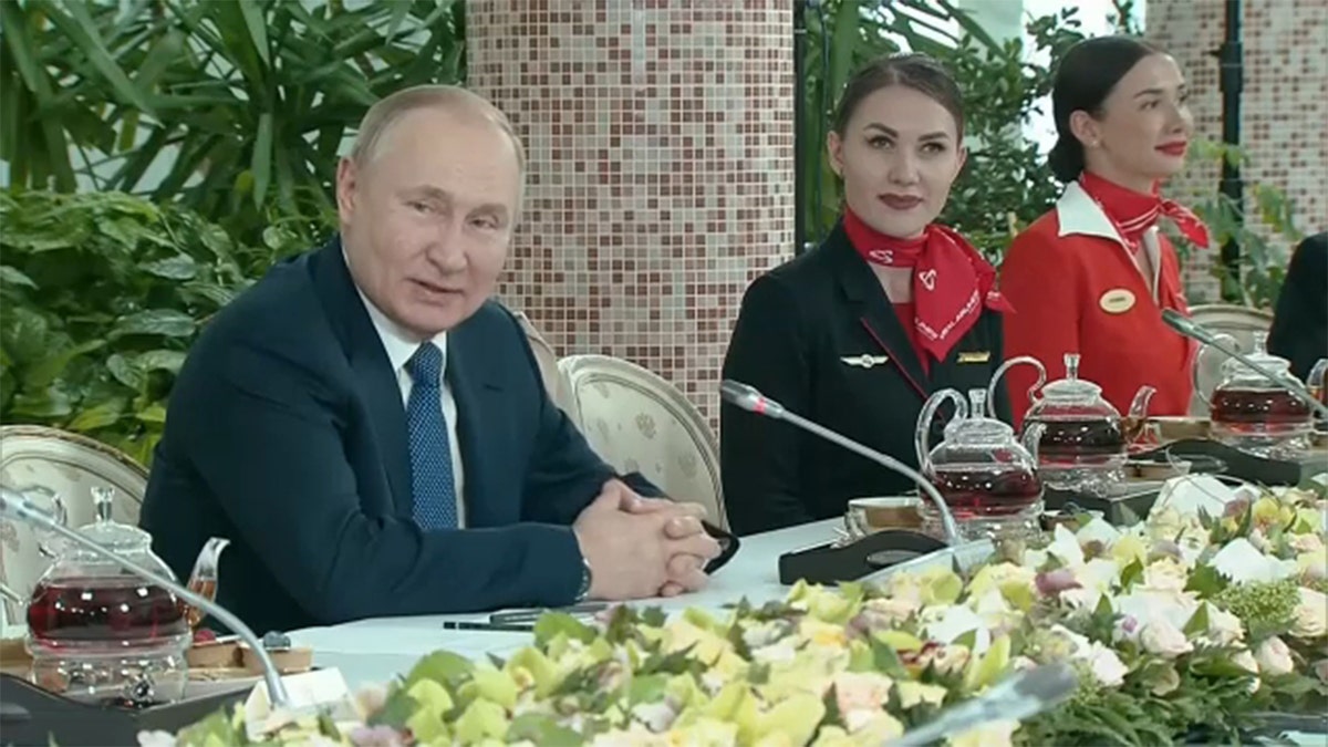 Russian President Vladimir Putin spoke to female flight attendants in comments broadcast on state television on Saturday, March 5, 2022. (Image: Reuters Video)