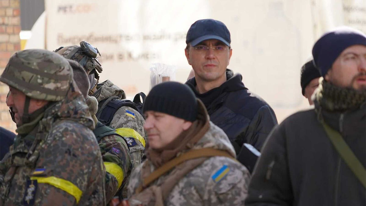 Volodymyr Omelyan, center, is Ukraine’s former minister of infrastructure and now a militiaman