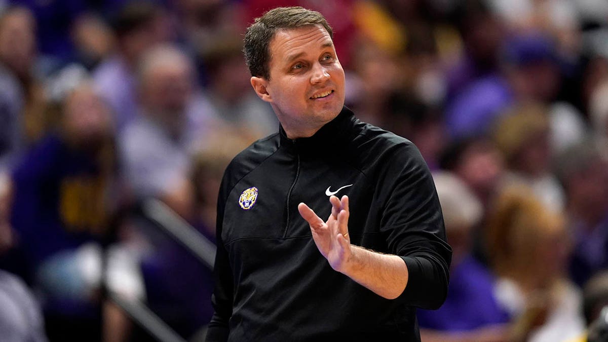 LSU head coach Will Wade walks along the bench in the first half an NCAA college basketball game against Alabama in Baton Rouge, La., Saturday, March 5, 2022.