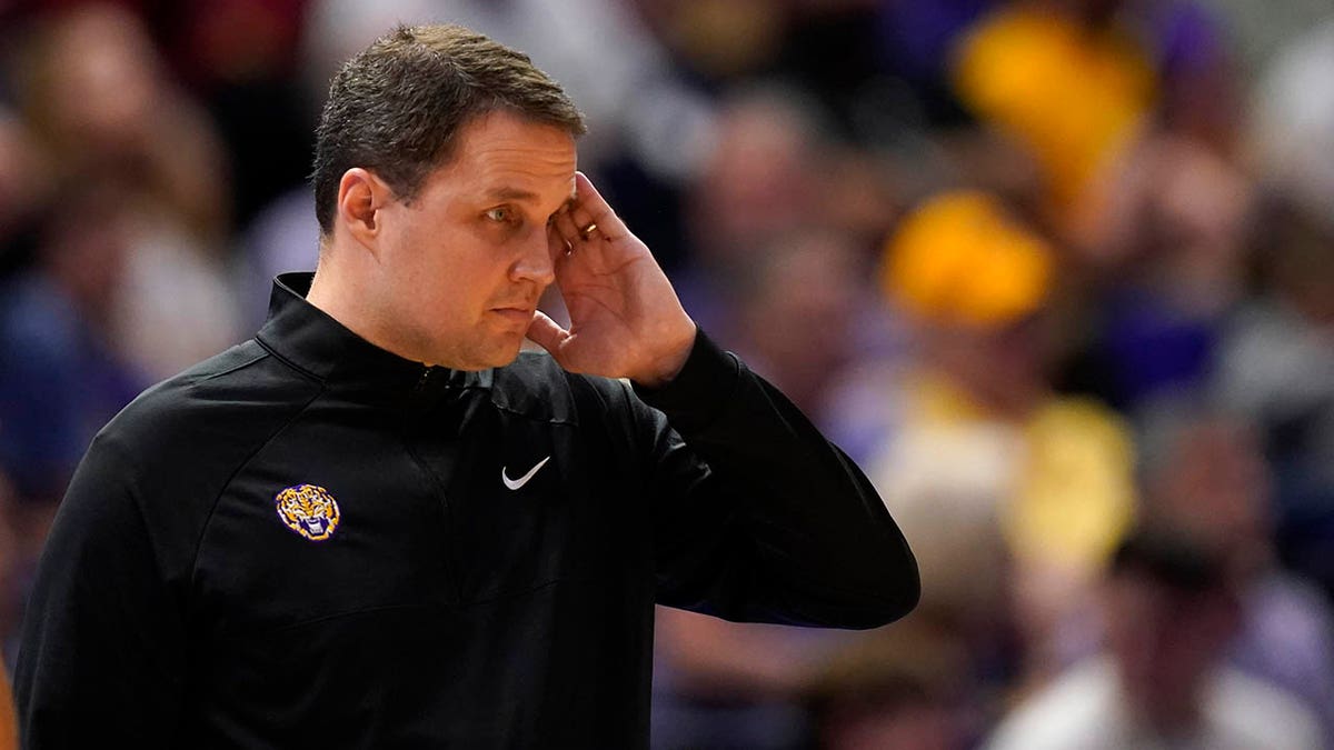 LSU head coach Will Wade walks along the bench in the first half an NCAA college basketball game against Alabama in Baton Rouge, La., Saturday, March 5, 2022.