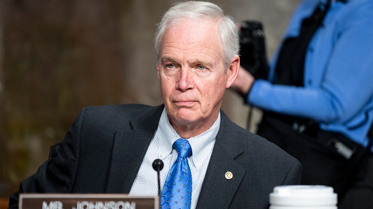 Sen. Ron Johnson wearing white shirt and blue tie