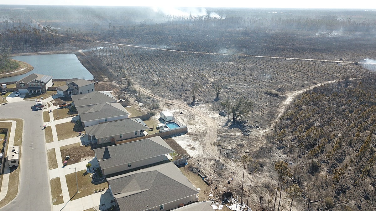 Massive wildfires in the Florida Panhandle have scorched thousands of acres and forced the evacuation of at least 1,100 homes as firefighters battle gusting winds to contain the blazes on Monday.