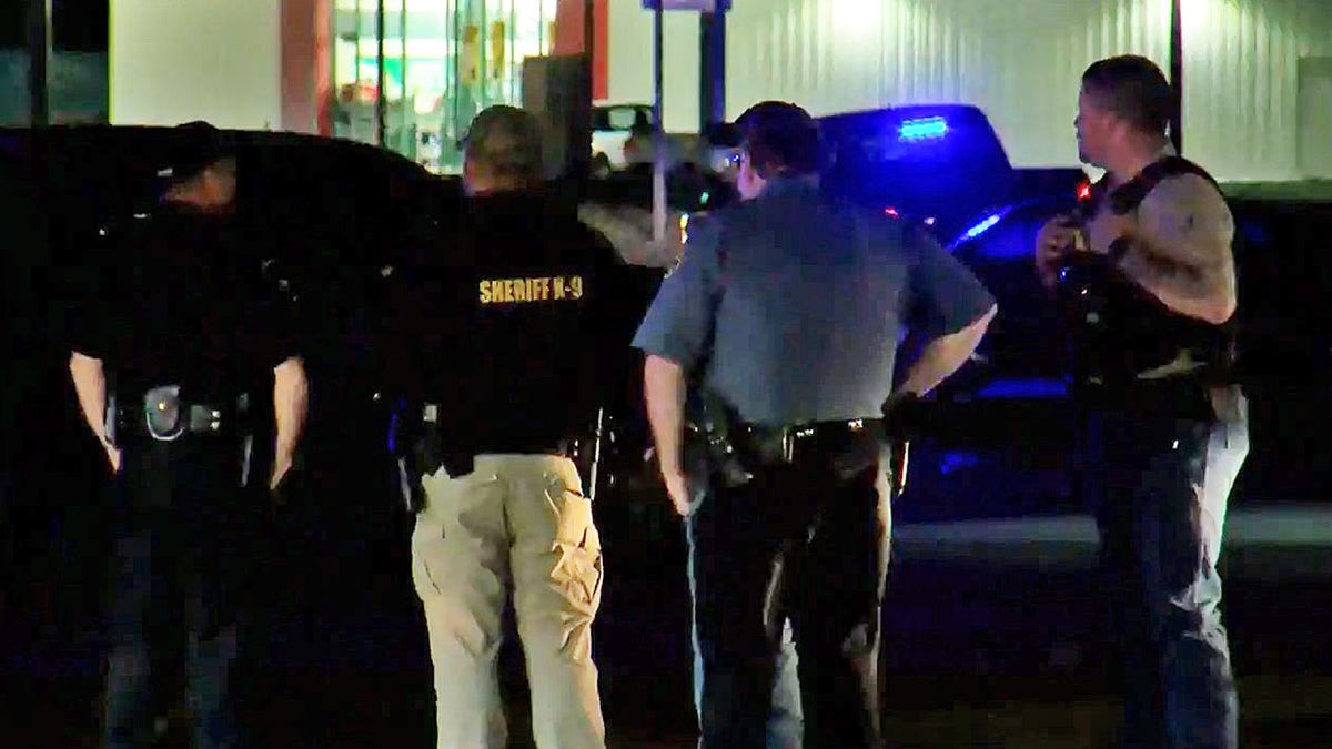 Law enforcement officers on the scene of a shooting in Dumas, Arkansas, March 19, 2022. (FOX 16 of Little Rock)