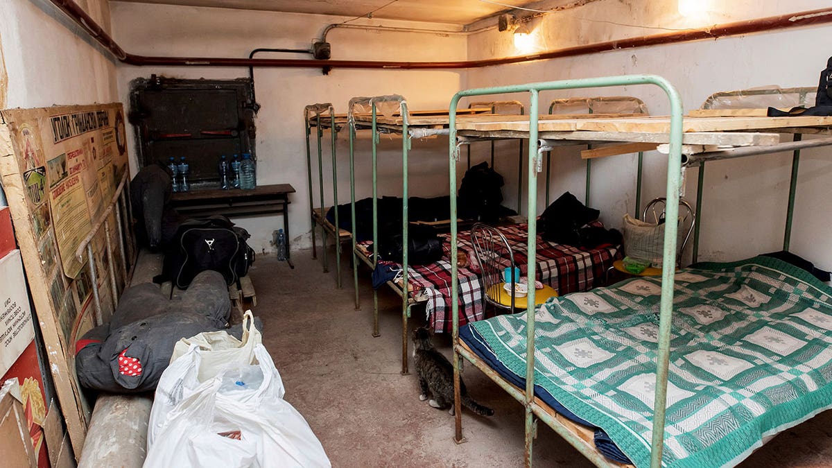 Beds and personal items are shown in a bomb shelter area at the Interpipe Steel plant in Dnipro, Ukraine, Thursday, March 10, 2022. 