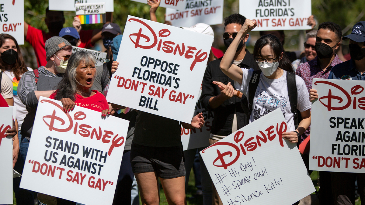 Walt Disney employees and demonstrators during a rally against the Florida "Don't Say Gay" bill at Griffith Park in Glendale, California, U.S., on Tuesday, March 22, 2022. 