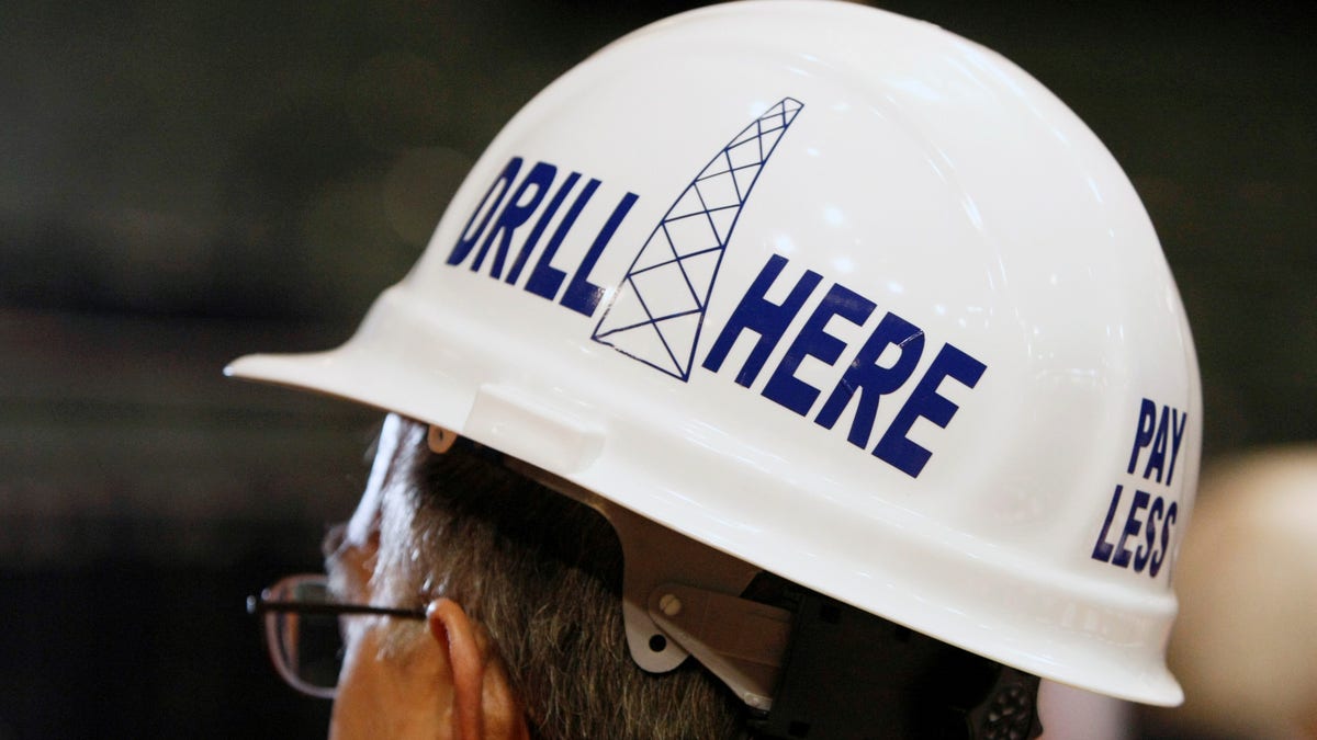 A delegate from Alaska wears a hard hat in support of drilling for oil at the second session at the 2008 RNC in St. Paul. REUTERS/Rick Wilking