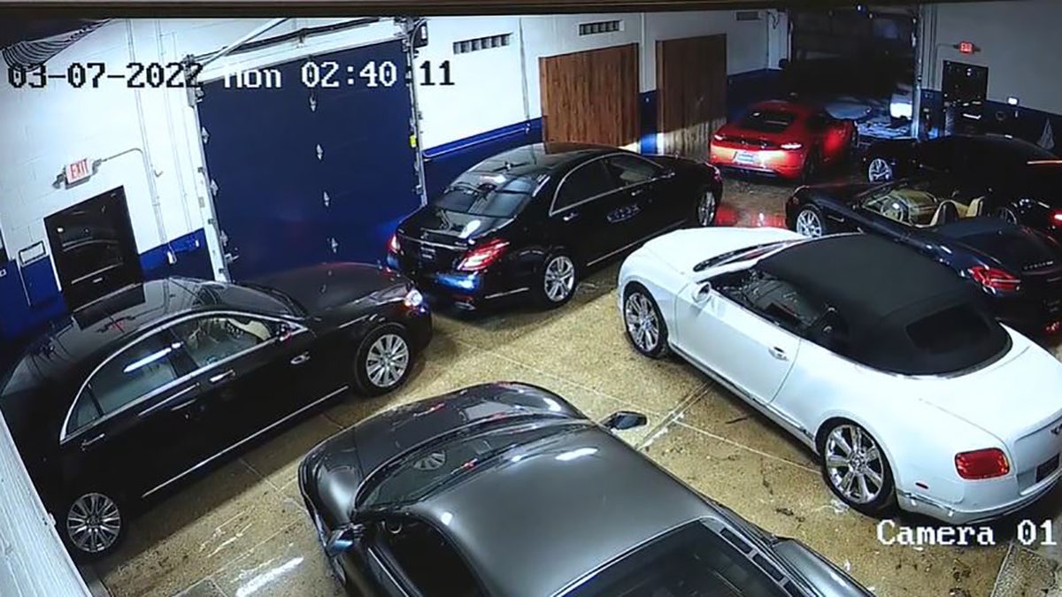 A group of thieves drove off with nearly $1 million worth of luxury cars from a dealership in a Chicago suburb early Monday, authorities said.