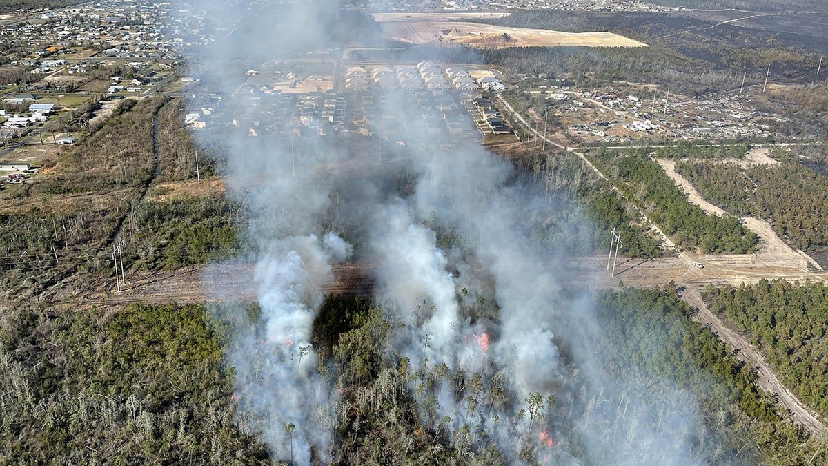 Massive wildfires in the Florida Panhandle have scorched thousands of acres and forced the evacuation of at least 1,100 homes as firefighters battle gusting winds to contain the blazes on Monday.