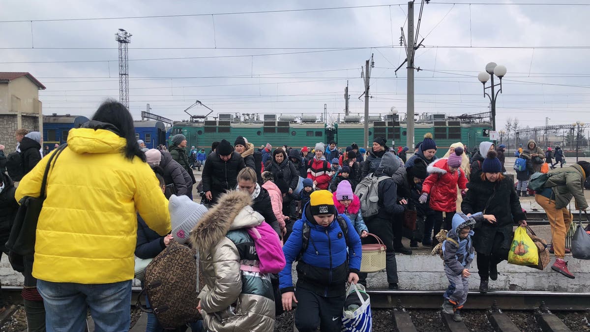 Lviv, Ukraine, train station as Russia war sparks refugee crisis