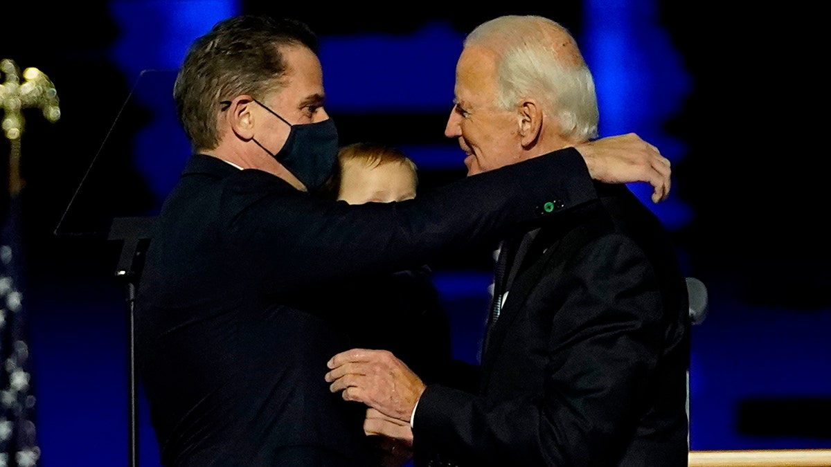President-elect Joe Biden embraces his son Hunter Biden after addressing the nation from the Chase Center November 07, 2020 in Wilmington, Delaware.