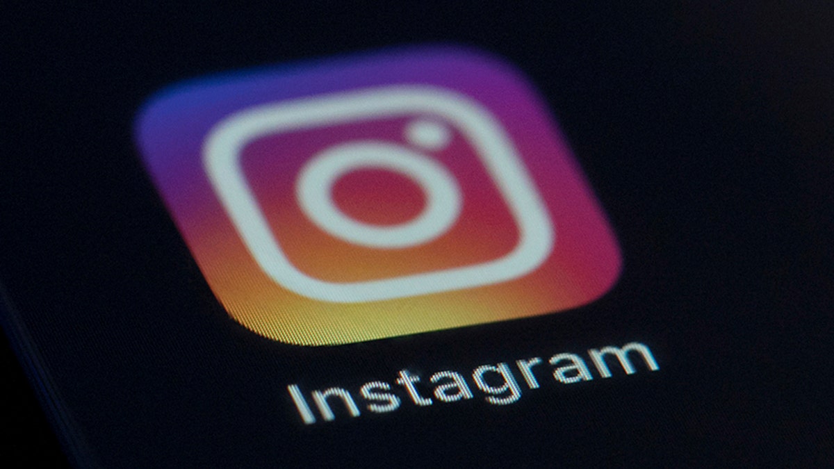 The Instagram app icon on the screen of a mobile device 