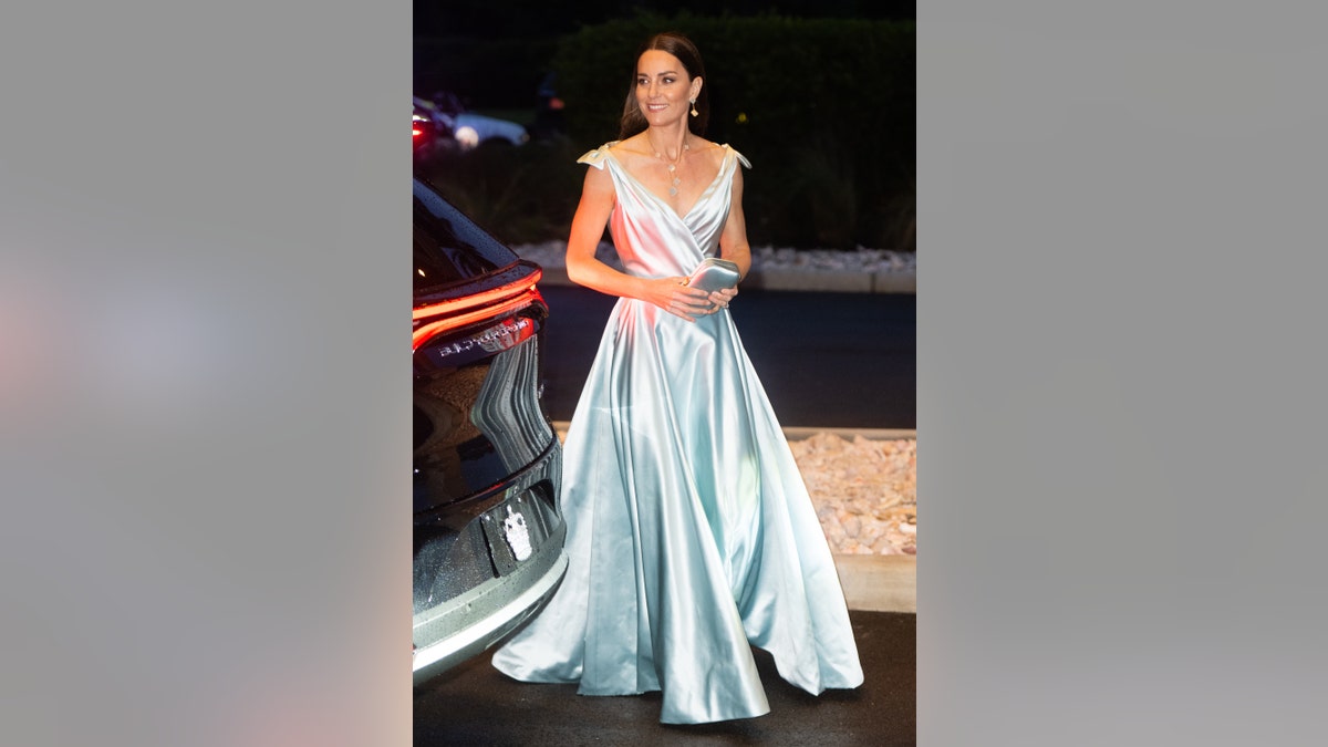 Catherine, Duchess of Cambridge wowed in a satin turquoise dress in the Bahamas on Friday.