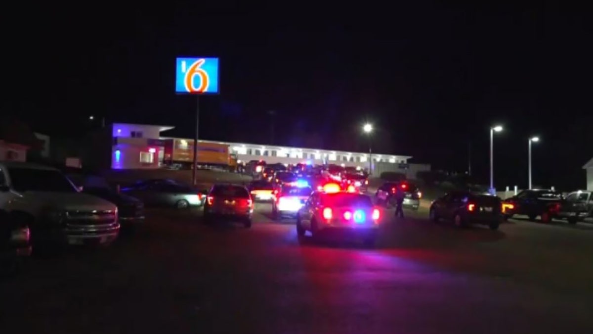 A Missouri police officer was killed early Thursday in a motel shootout that left another officer wounded and a gunman dead, authorities said.