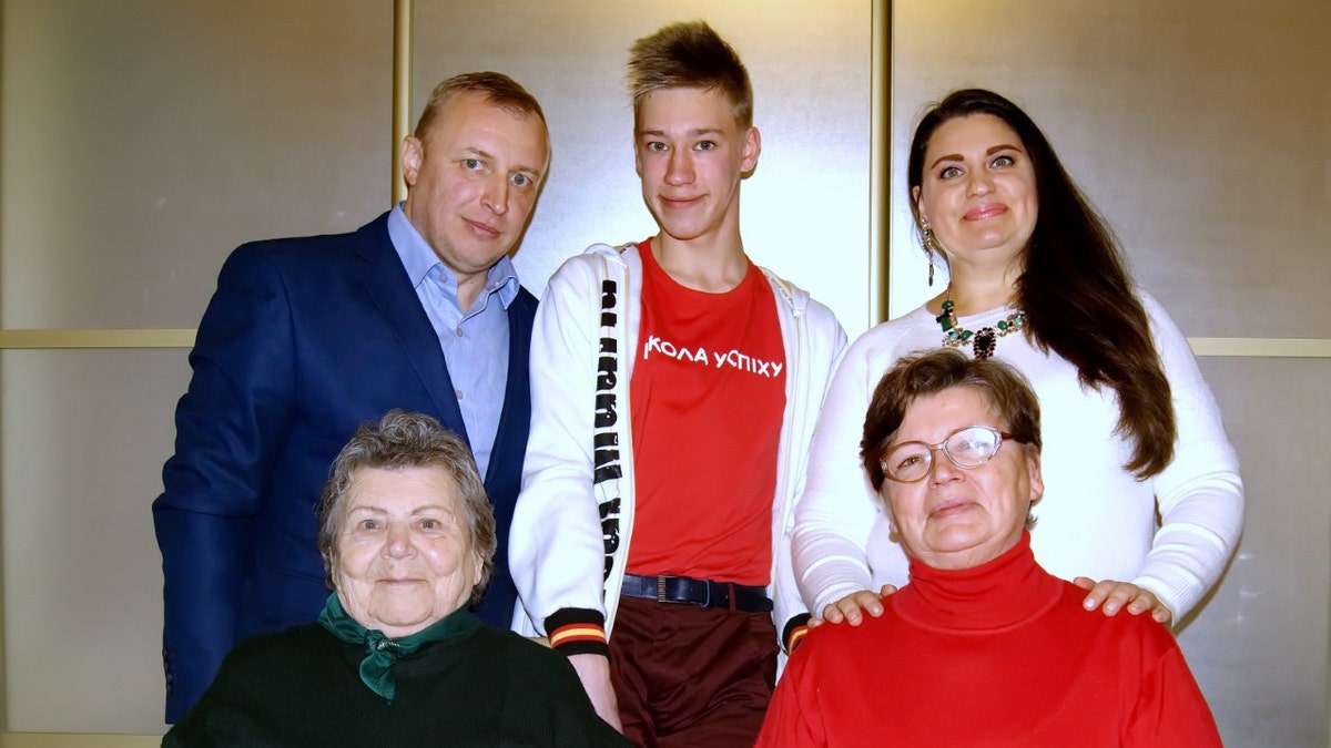 Matthew Frantsuzhan, 17 (center), an exchange student from Ukraine, poses with his father Ivan, his mother Olga, his great-grandmother Olga, 92 (first row, far left) and his grandmother Galina, 67.