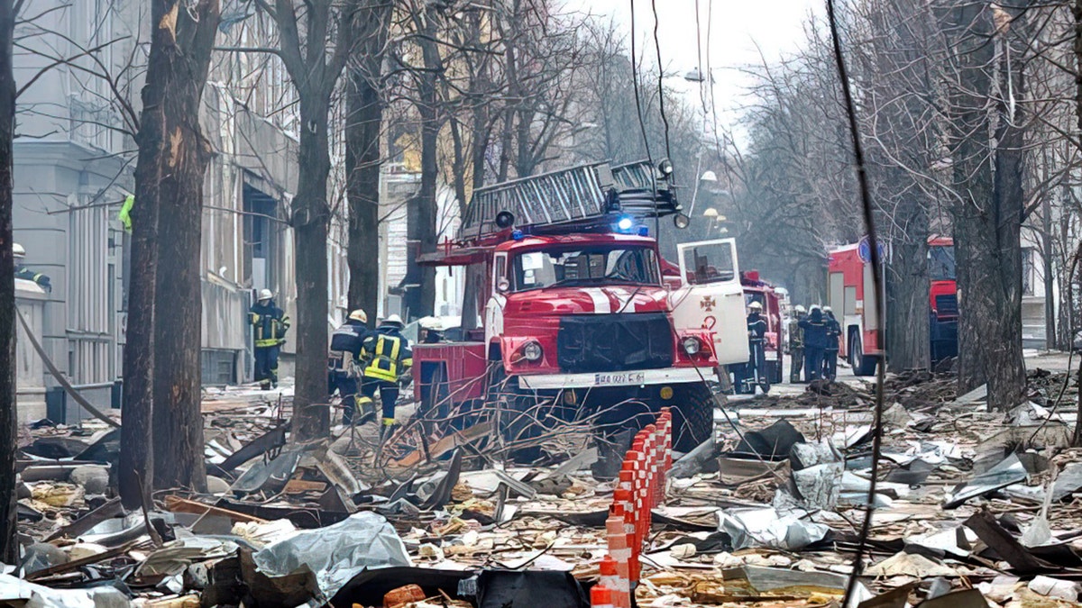 Firefighters work to contain a fire in the complex of buildings housing the Kharkiv regional SBU security service and the regional police, allegedly hit during recent shelling by Russia, in Kharkiv on March 2, 2022.