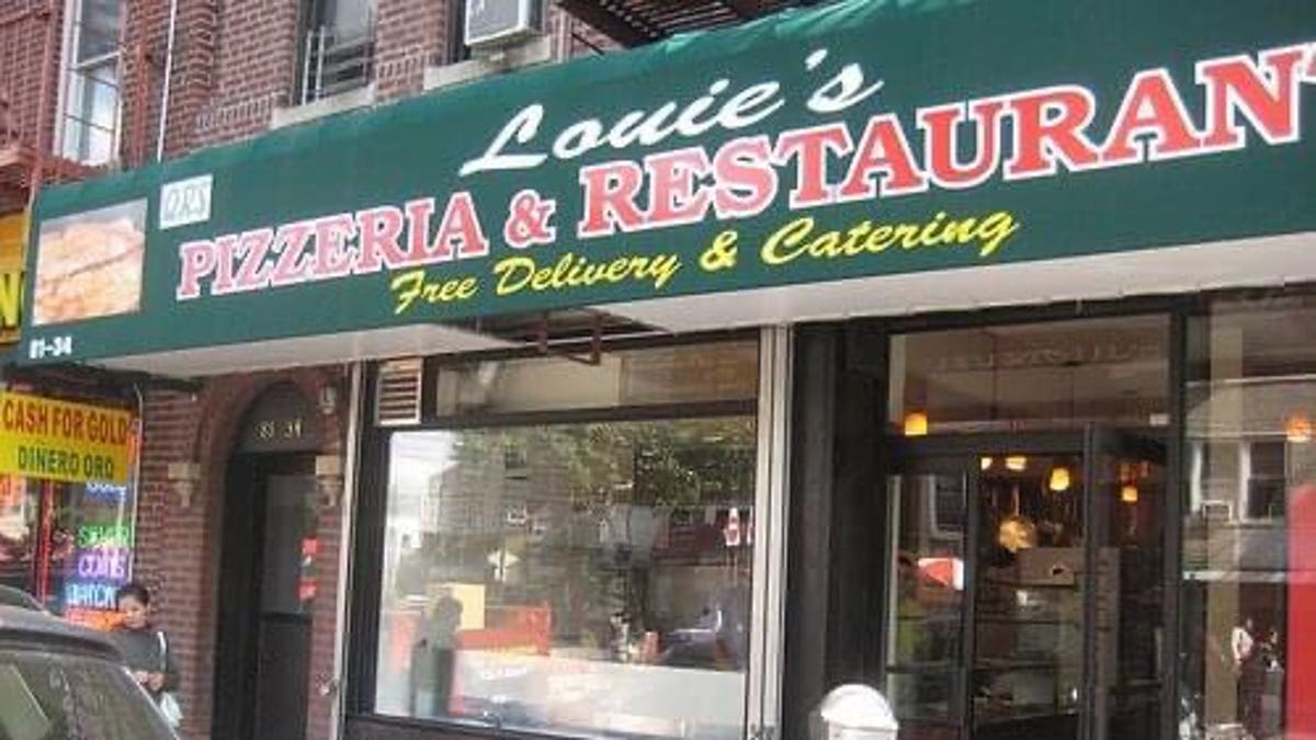 The outside of Louie's Pizzeria where the alleged robbery took place.?